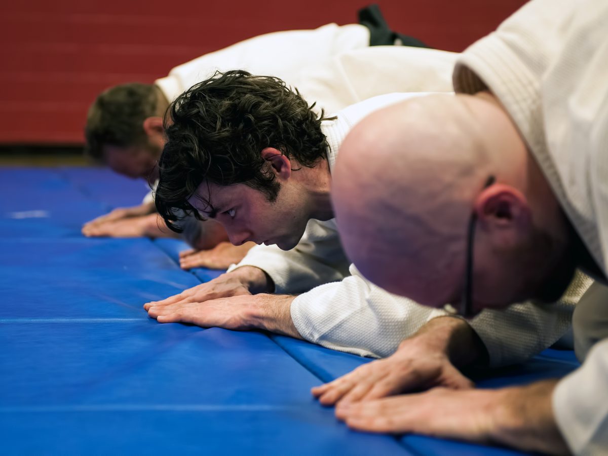 Students bowing at the start of class